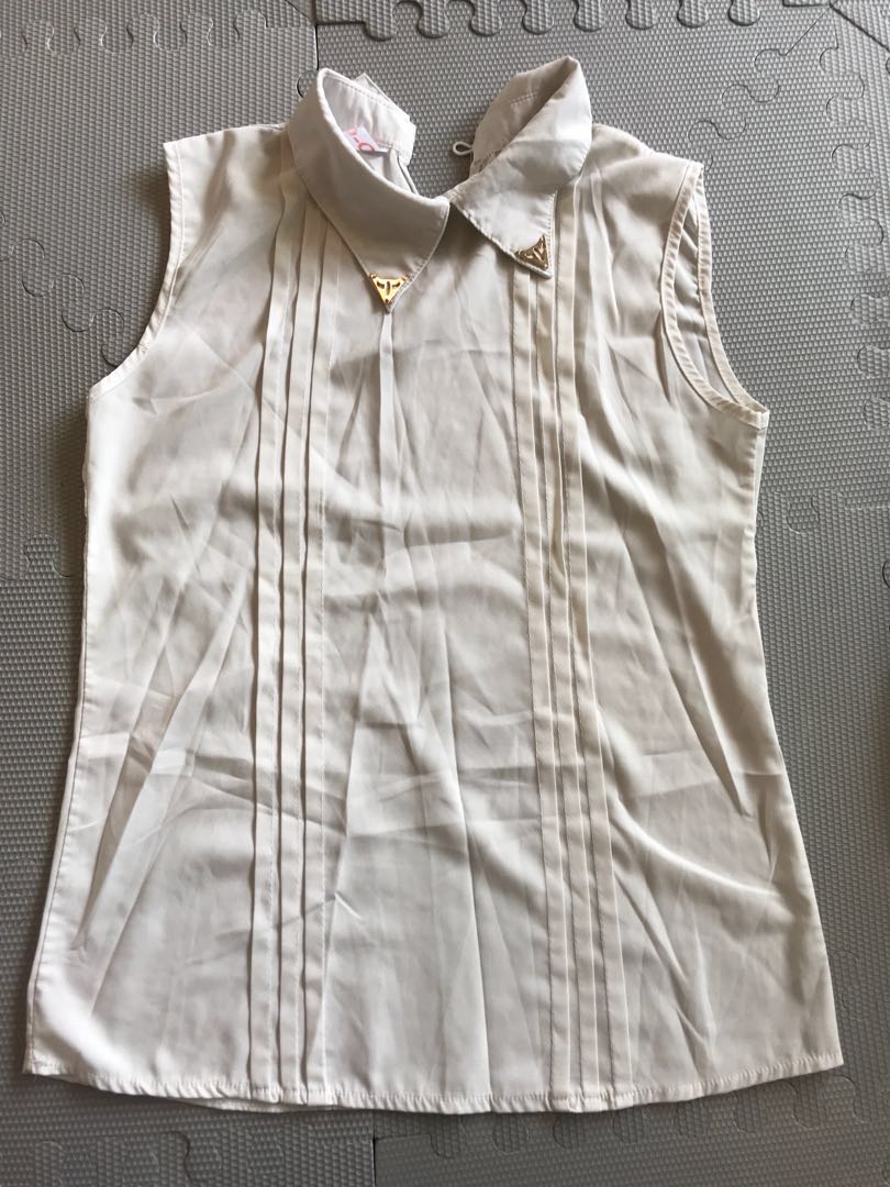 sleeveless corporate attire