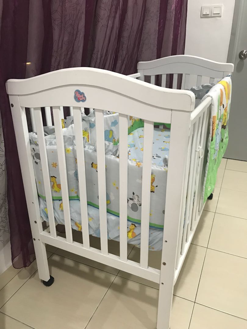 Cherry wood baby bed online