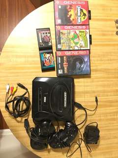 Sega Genesis + 5 games and 2 controllers Sega Genesis + 5 games and 2 controllers