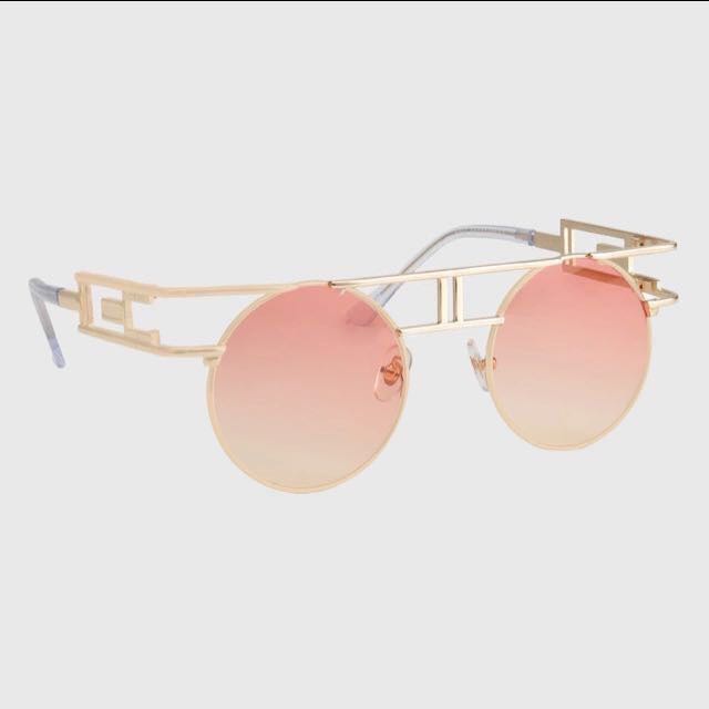 gold rim round sunglasses