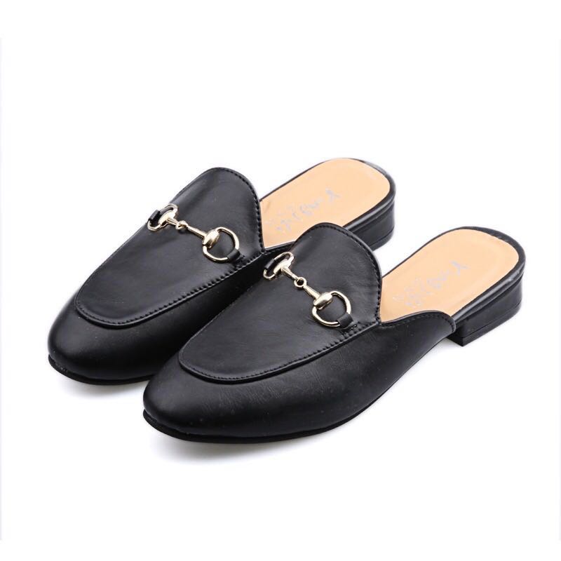 black mules with gold buckle