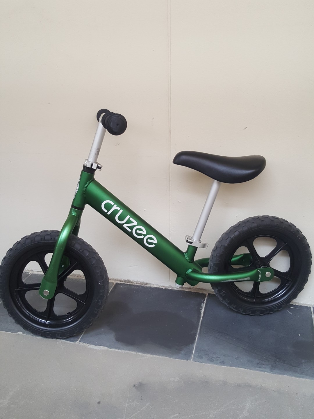 mint green balance bike