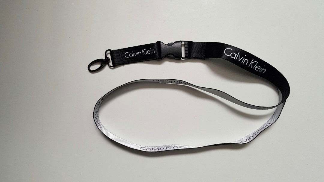 Calvin Klein Lanyard, Men's Fashion, Watches & Accessories, Handkerchief &  Pocket Squares on Carousell