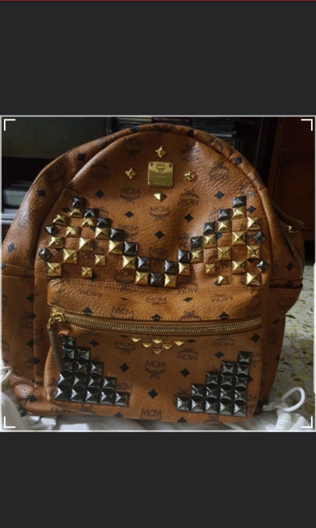 MCM Backpack with studs (Category: Backpacks) located in Singapore. Submitted by fiestar444 (Listing ID 147463552, Image 1). Description: .