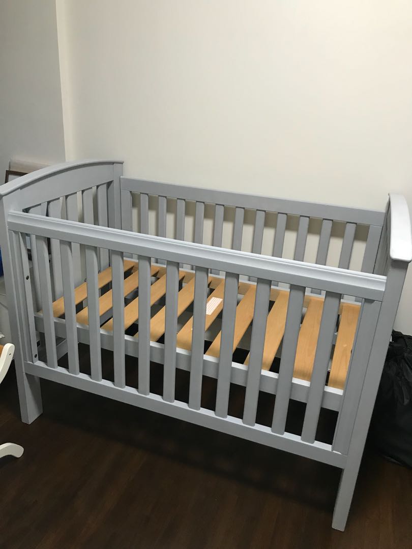 grey wood cot
