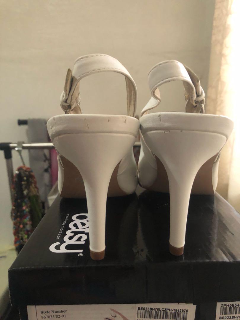 White Heels (Category: Heels) located in Manila. Submitted by elan_byk (Listing ID 174428817, Image 1). Description: It's actually super nice in person. I bought it online last year from Zalora but it doesn't fit my size. I never used it and was stored in the box only. There's a small chipped off part in the heel due to storage. Selling it low. Box included.
