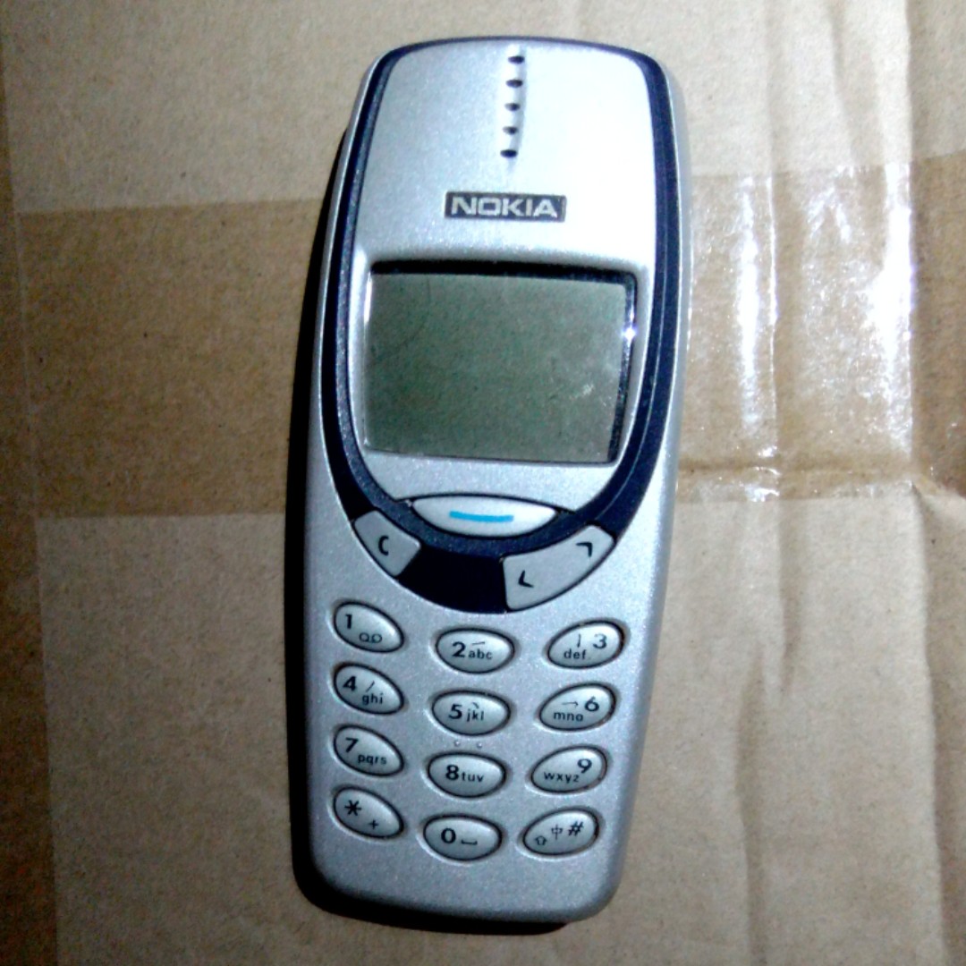 old antique vintage nokia mobile phone 3310 or 3330
