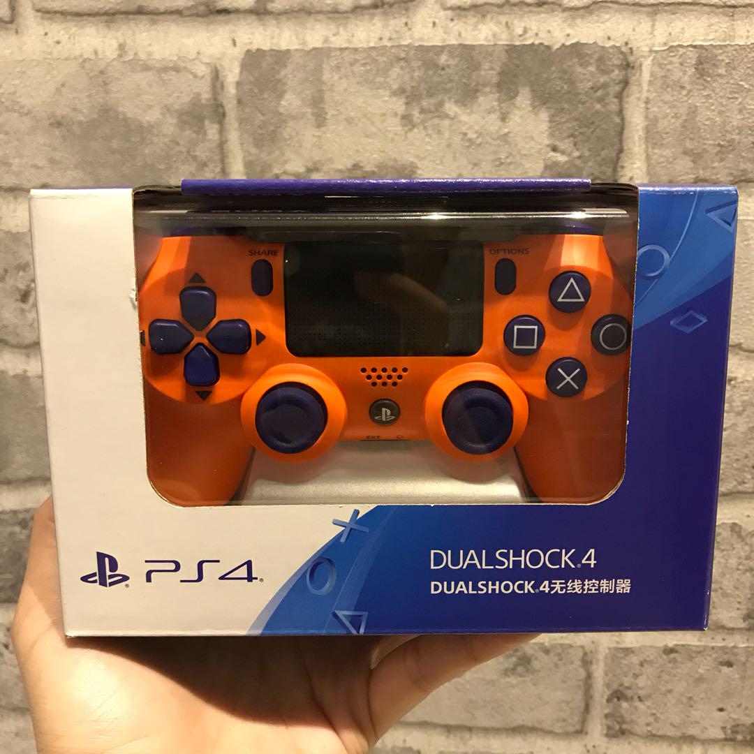 orange dualshock 4 controller