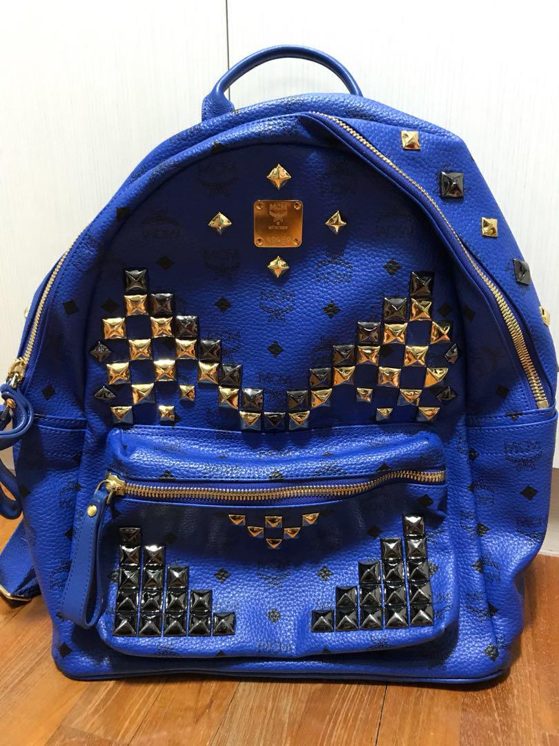 Blue MCM Bag with black and gold studs ( Authentic ), Luxury, Bags &  Wallets on Carousell