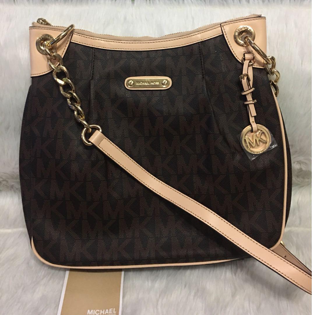 Michael kors Sling bag with flaw the handle strap damaged ok for sling  strap used only, Women's Fashion, Bags & Wallets, Cross-body Bags on  Carousell