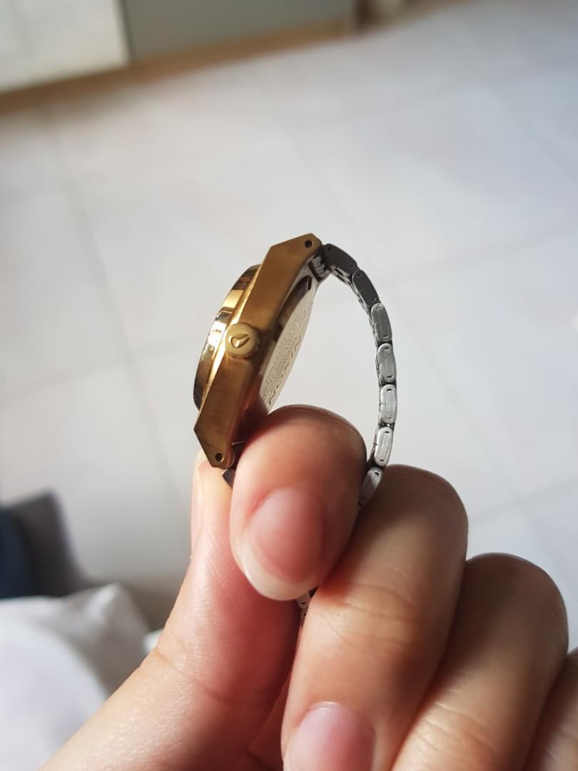 Nixon Small Time Teller Watch (Category: Women's Watches) located in Singapore. Submitted by vonamour (Listing ID 85162335, Image 3). Description: Gold and silver small time teller bracelet watch. .