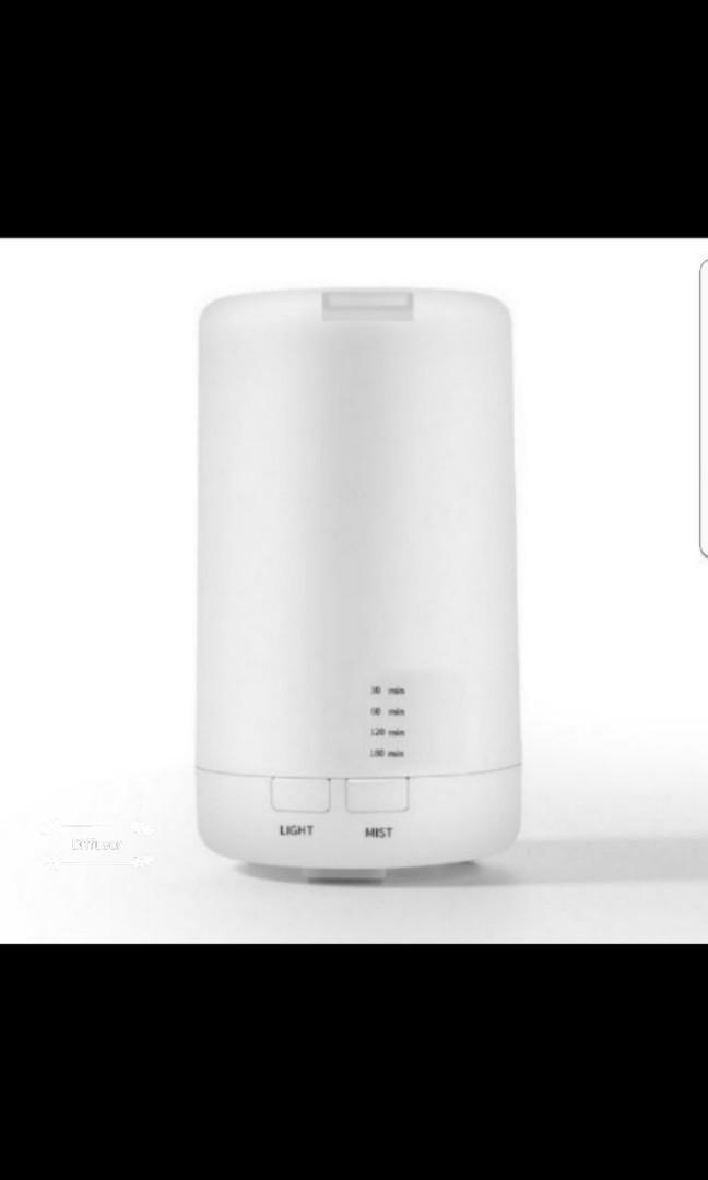 Aroma Diffuser (Category: Home Fragrance) located in Singapore. Submitted by anj2018 (Listing ID 175467698, Image 3). Description: BRAND NEW IN BOX Package Includes:- 1. Aroma Diffuser 2. 1X Bottles 10ml Essential Oil 3. 1X USB Cable (1 metre) Dimension:- 12cm*7cm FEATURES: - 70ml Capacity - 7 LED Lights Selection - Up to 3 hours continuous diffusion - Auto Power Off function when water level is low - 30mins, 60mins, 120mins, 180mins timer option