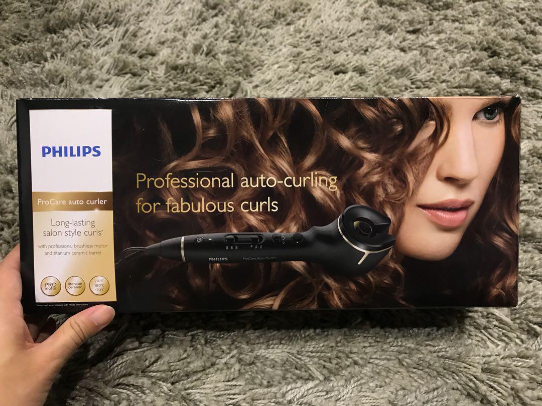 Hailo  The Philips ProCare Auto Curler automatically makes consistently  fabulous curls The professional brushless motor and titanium ceramic  heating barrel automatically rolls heats and curls hair to create a  perfect curl