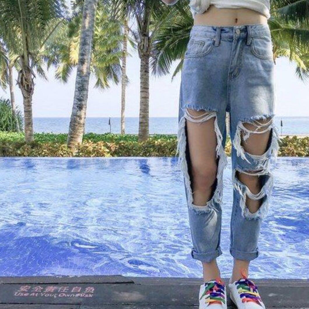 extremely ripped jeans women's