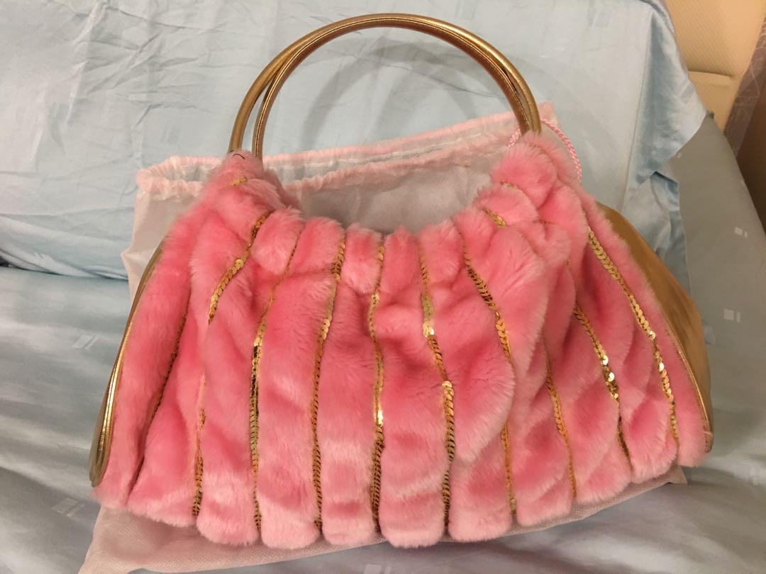 pink faux fur bag
