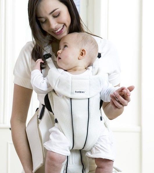 white baby carrier