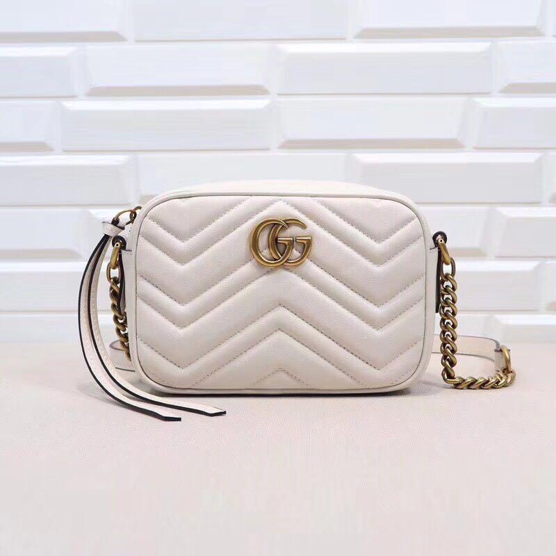 gucci gg marmont small quilted camera bag