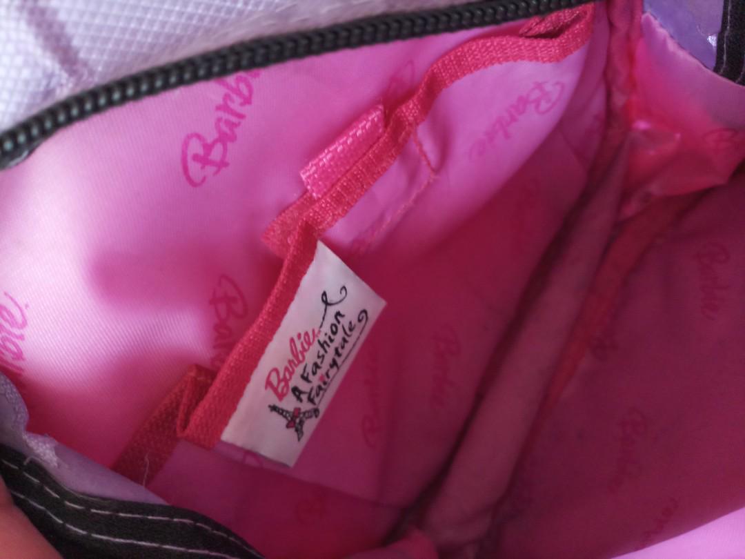 Barbie Mini Backpack (Category: Diaper Bags & Wetbags) located in Valenzuela. Submitted by twins_mom_prelovedstuffs (Listing ID 176121270, Image 2). Description: Flaws- see last pic ( pero dpo affected un labas) May name po cya s likod ng bag.