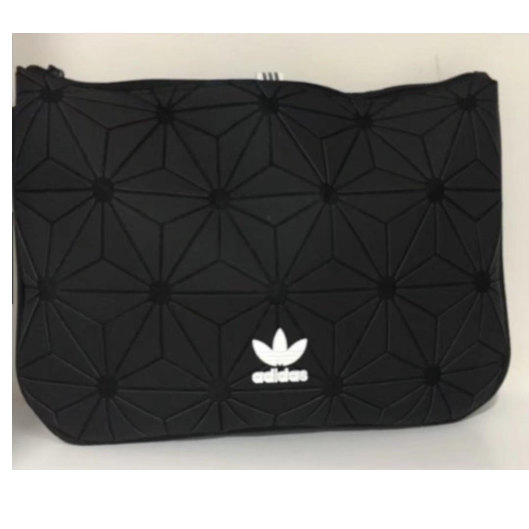 Issey Miyake 3D Clutch Sleeve Adidas Hand bag Men s and women s bag Women s Fashion Bags Wallets Cross body Bags on Carousell