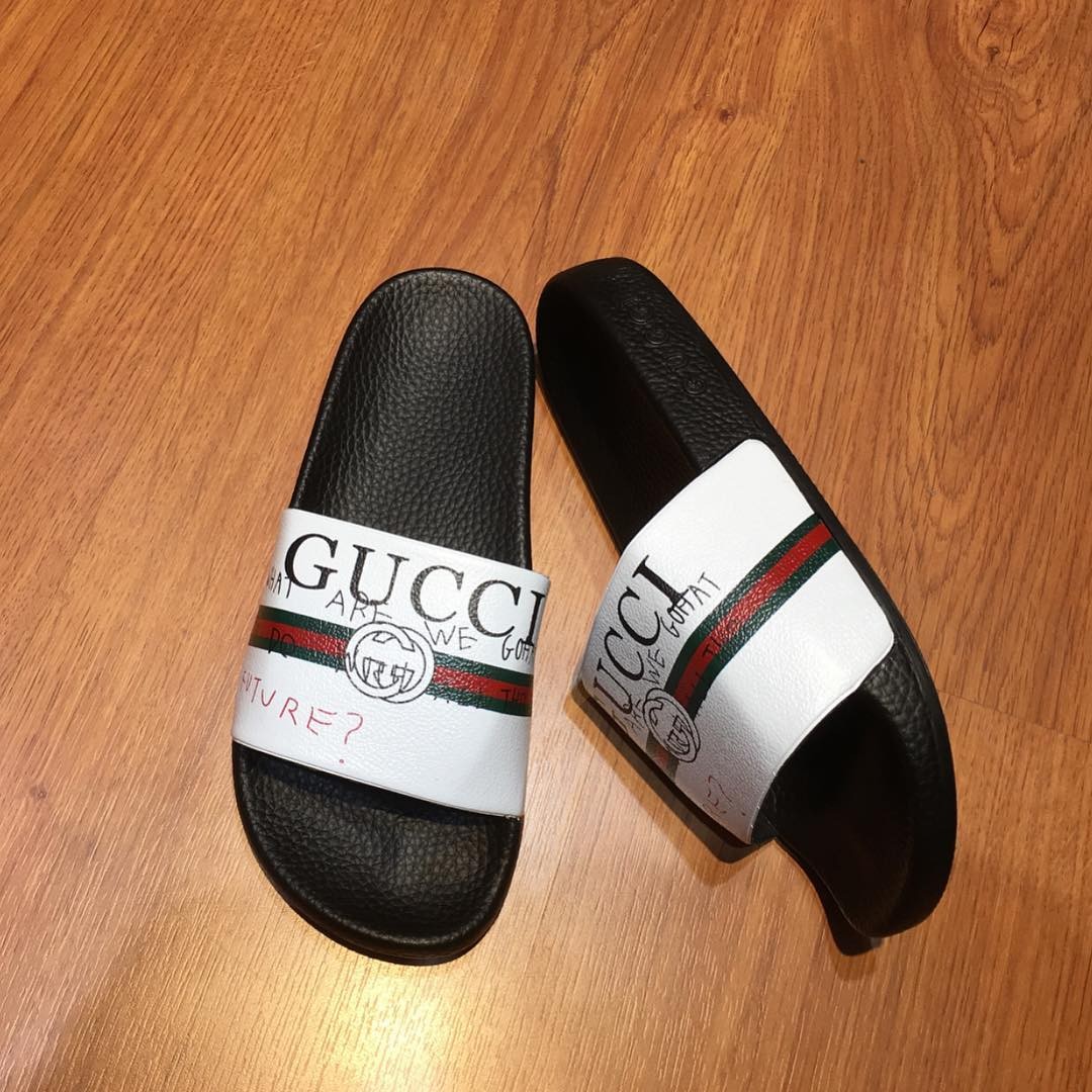 sandal merk gucci