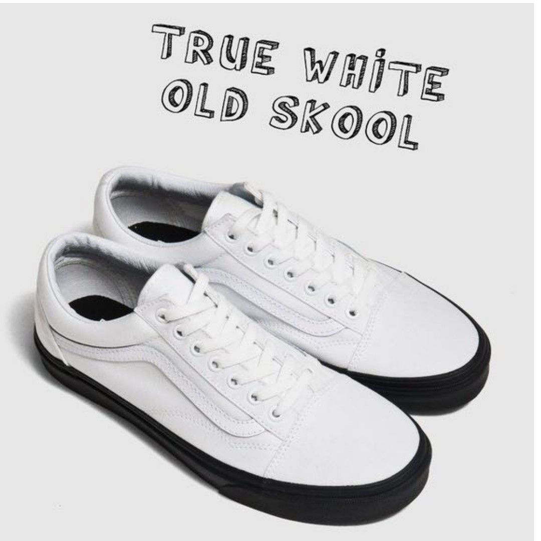 black and white sole vans