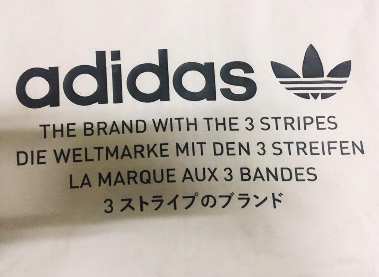 Adidas Nmd Tee/Tshirt with shoulder tape Japan Words, Men's Fashion, Tops &  Sets, Tshirts & Polo Shirts on Carousell
