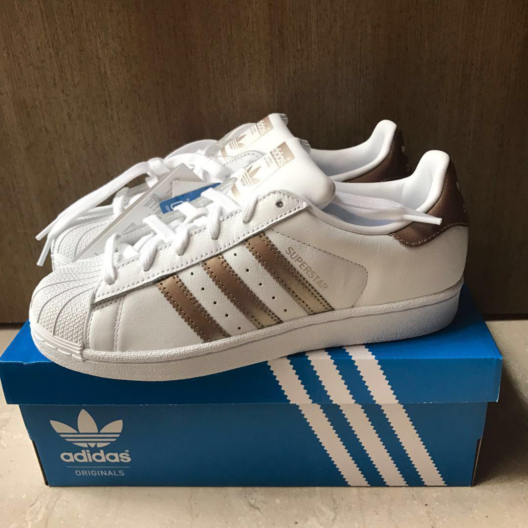 Bmwt Adidas Superstar Gold stripes shoes, Women's Sneakers on Carousell