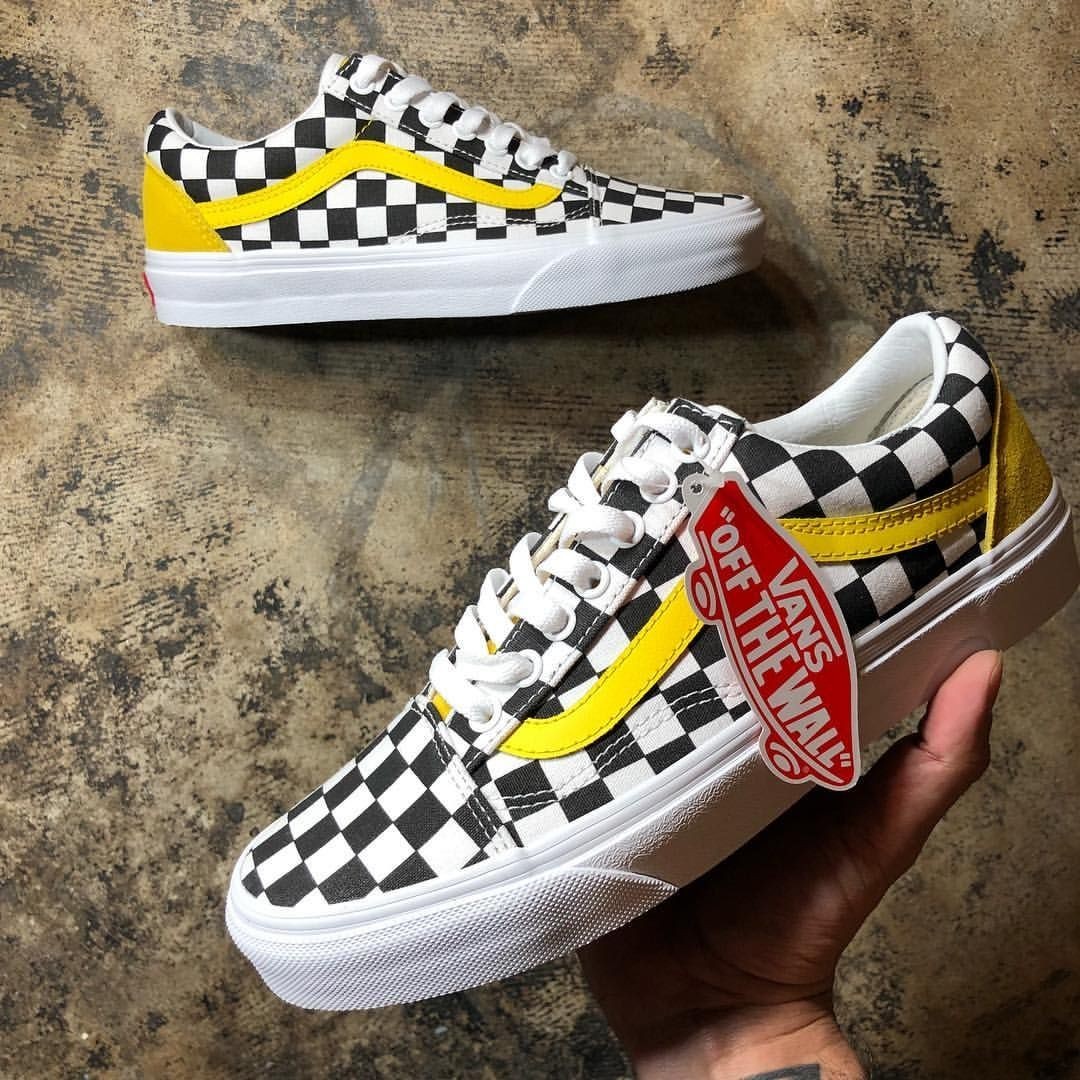 black and white vans with yellow stripe