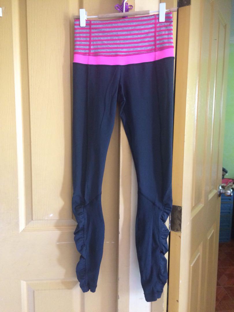 Lululemon black/pink tights (Category: Activewear) located in Pasig City. Submitted by sandacecloset (Listing ID 176807388, Image 1). Description: lightly used, excellent used condition Opp 800.