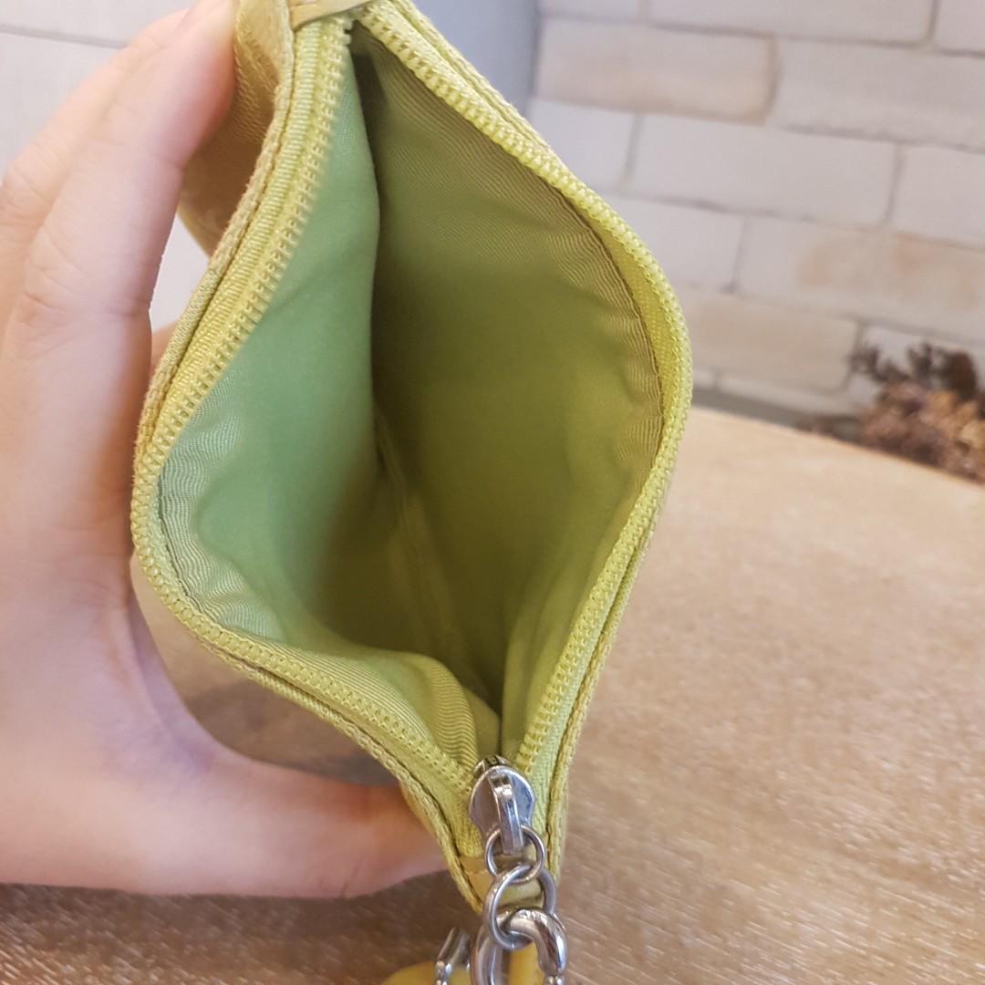 Lime green Coach wristlet with signature Cs Luxury Bags