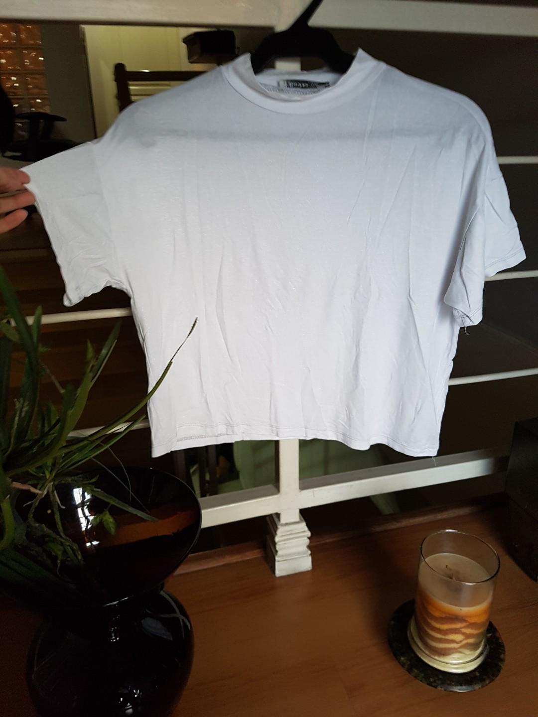 [ BERSHKA ] white turtleneck hanging top (Category: Others Tops) located in Pasig City. Submitted by soph.declutters (Listing ID 177351010, Image 1). Description: super ganda nito bes super loved ko din to.