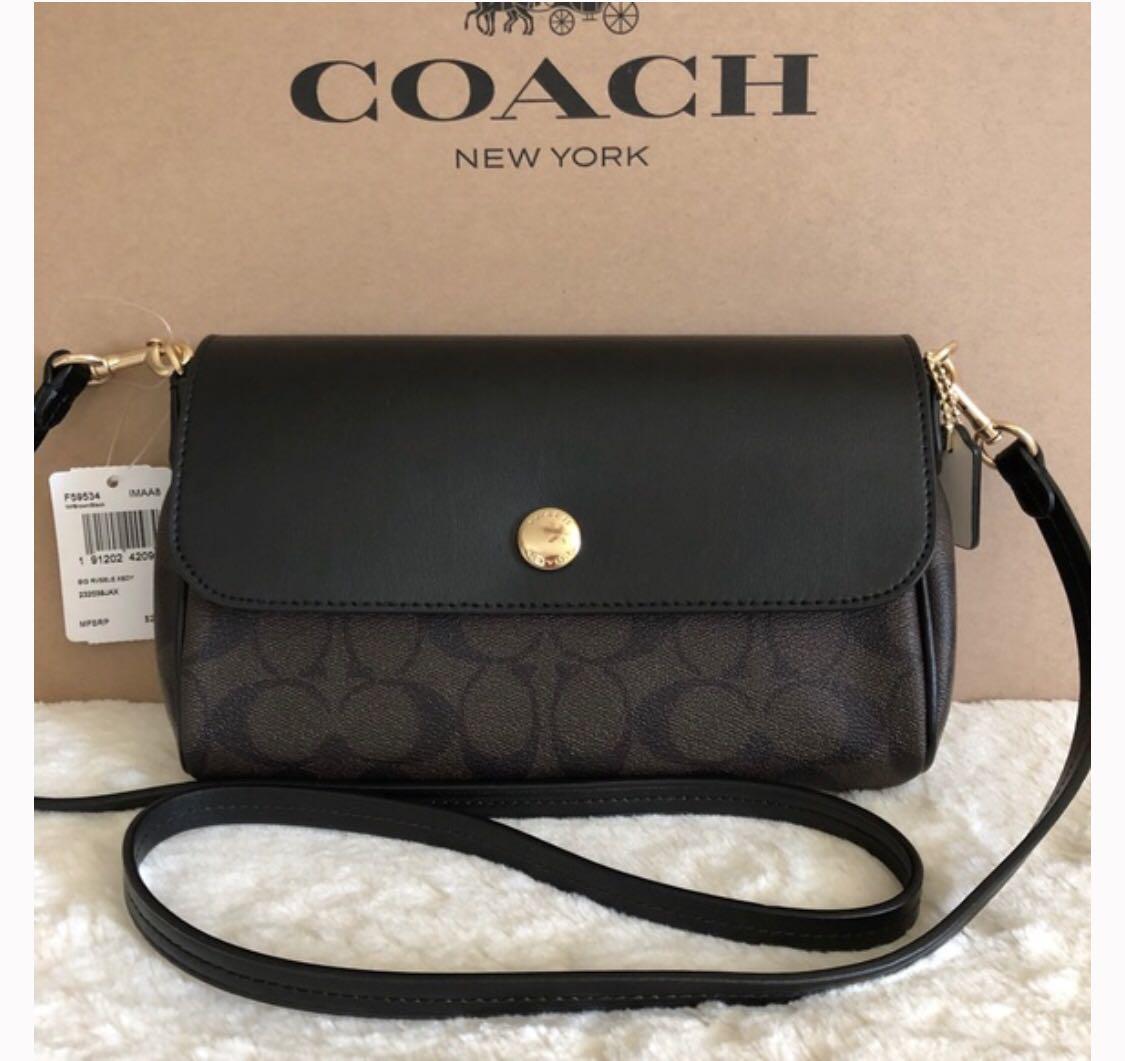 Coach sling bag 2025 price singapore