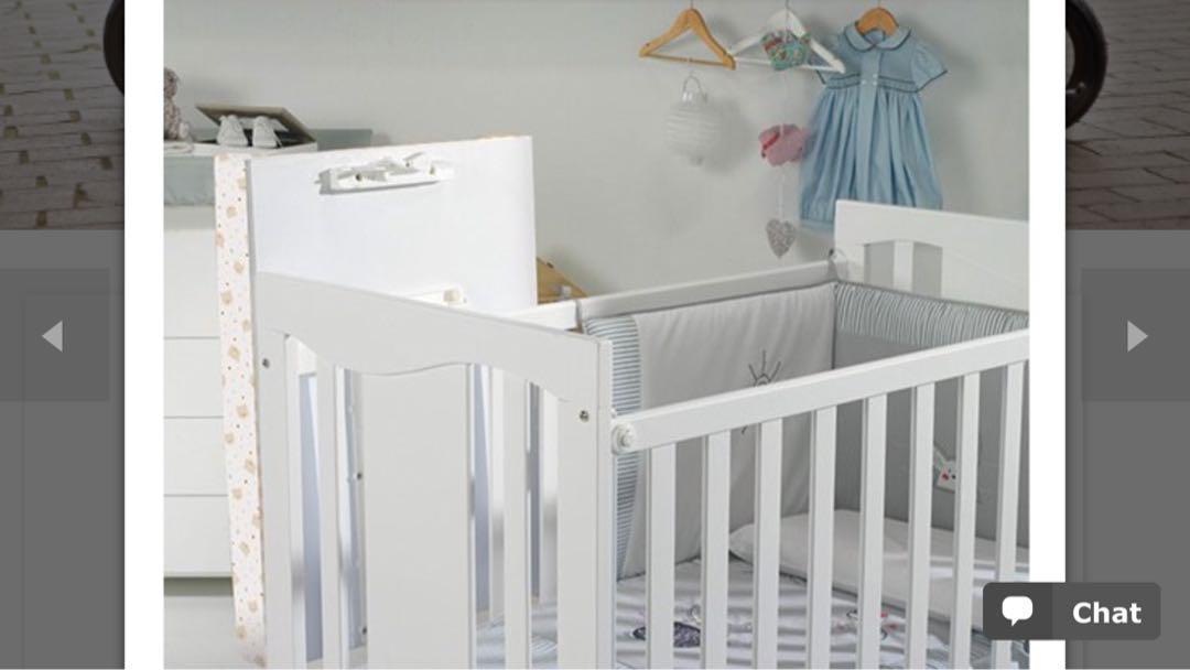 changing board over cot