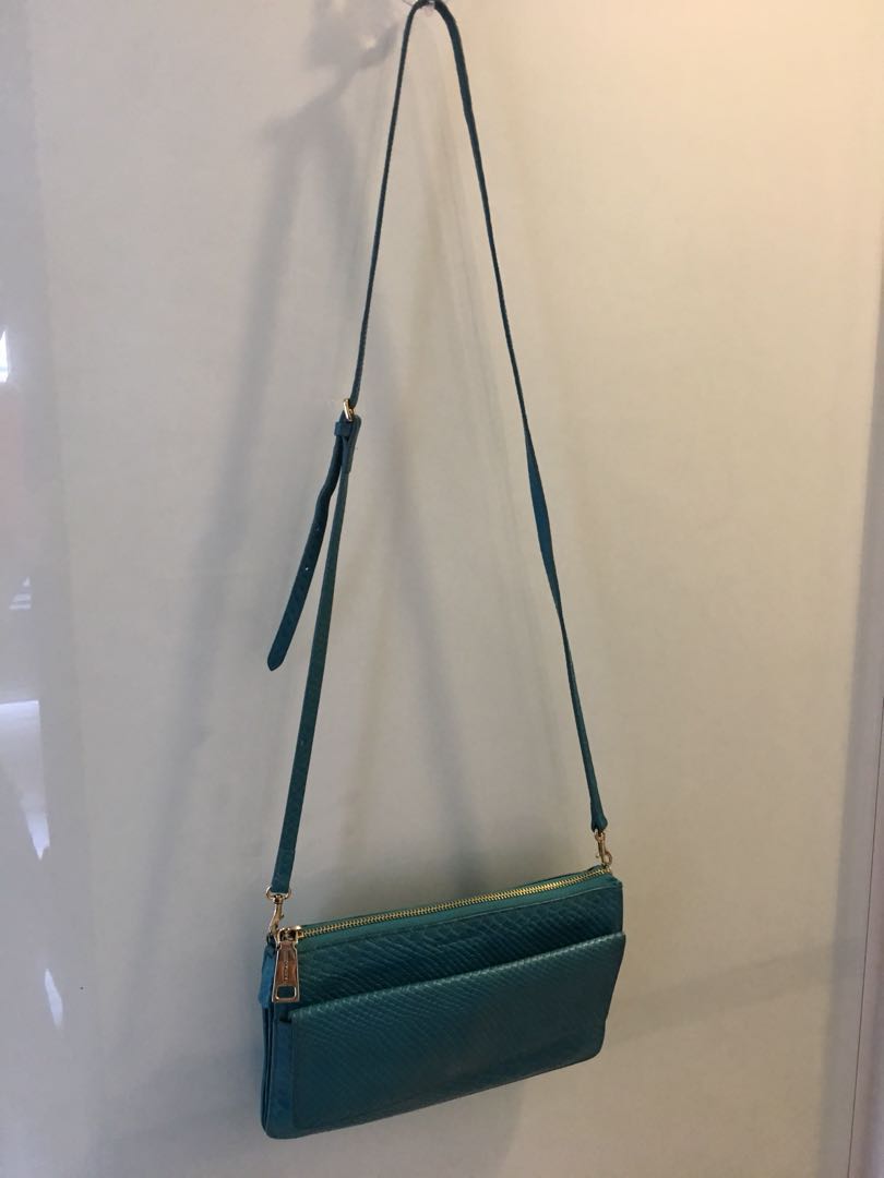Rabeanco turquoise blue sling bag, Women's Fashion, Bags & Wallets, Crossbody Bags on Carousell