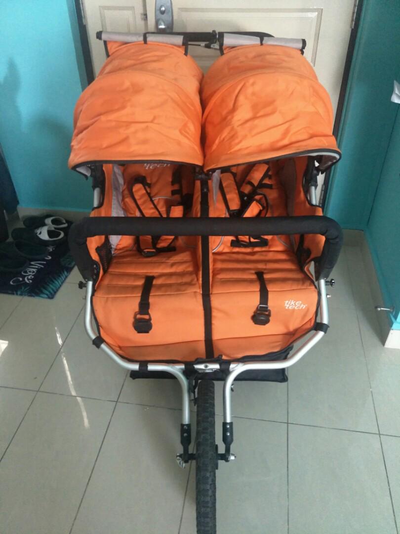 tike tech double jogging stroller orange