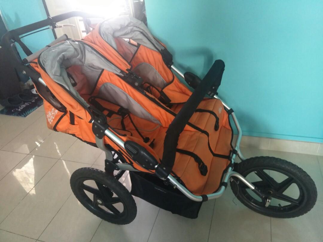tike tech double jogging stroller orange
