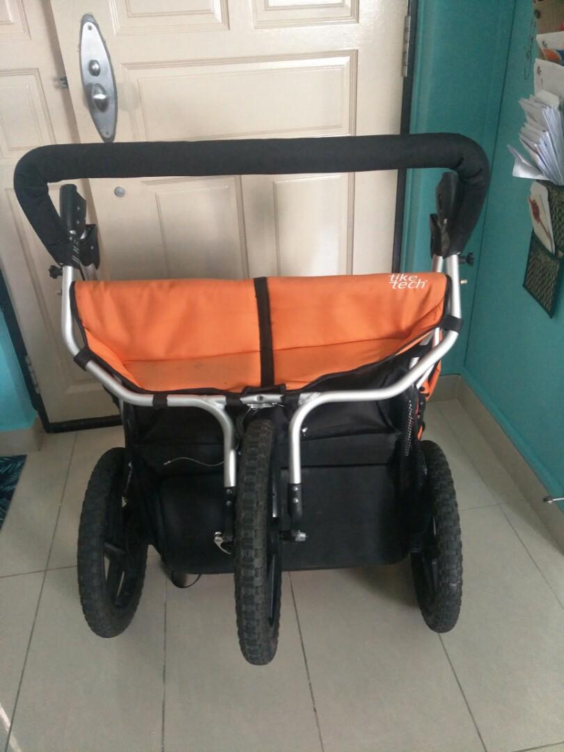 tike tech double jogging stroller orange