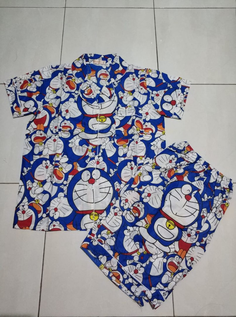 Baby top doll doraemon