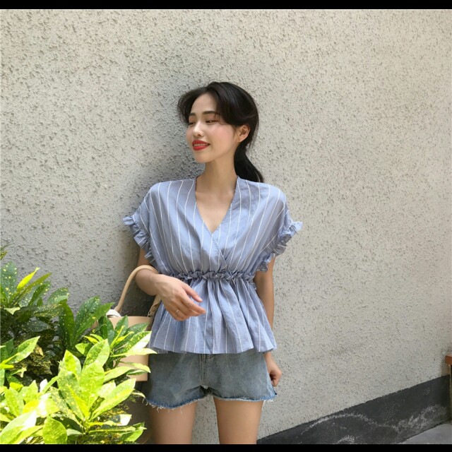 light blue peplum top