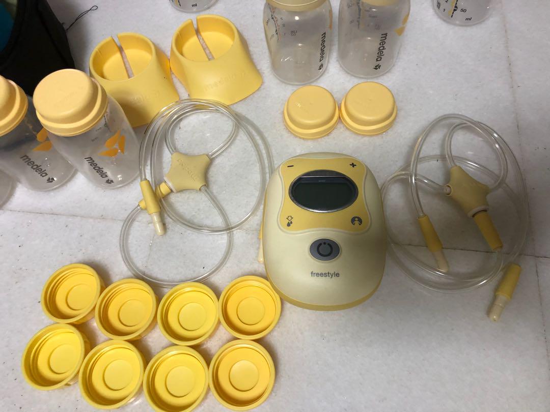 Medela Freestyle Breast Pump, Cooler set, Extra Pump Parts and Bottles
