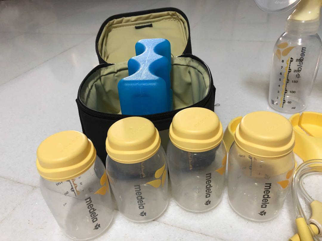 Medela Freestyle Breast Pump, Cooler set, Extra Pump Parts and Bottles