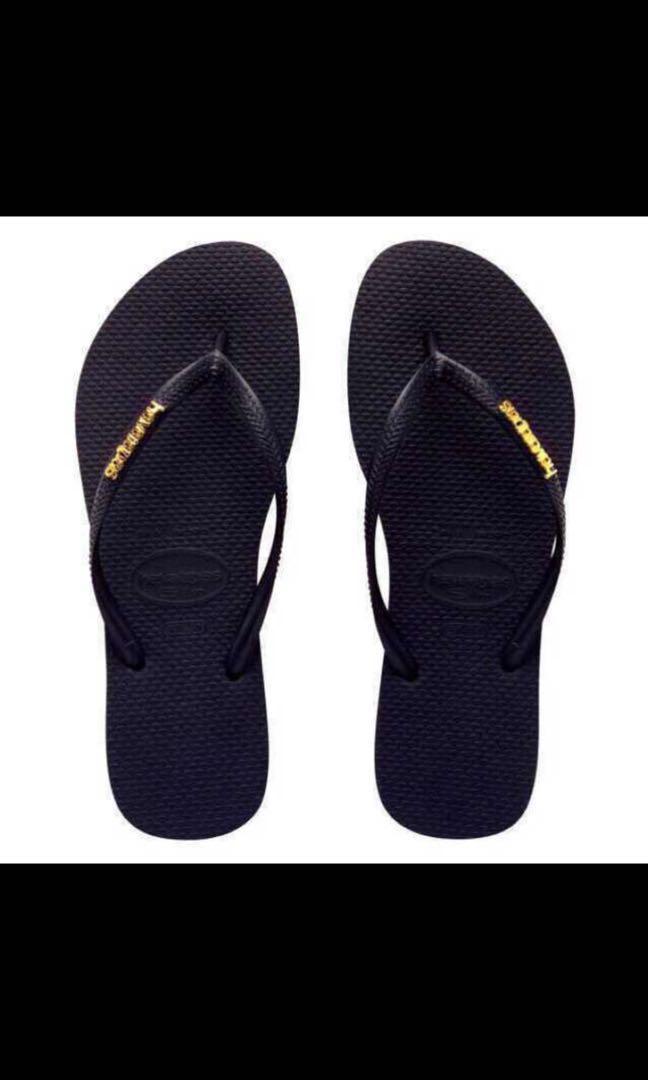 havaianas slim black with gold logo