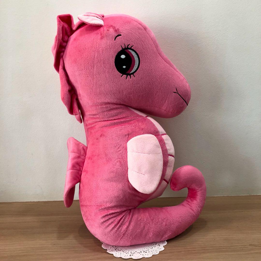 big pink stuffed animal