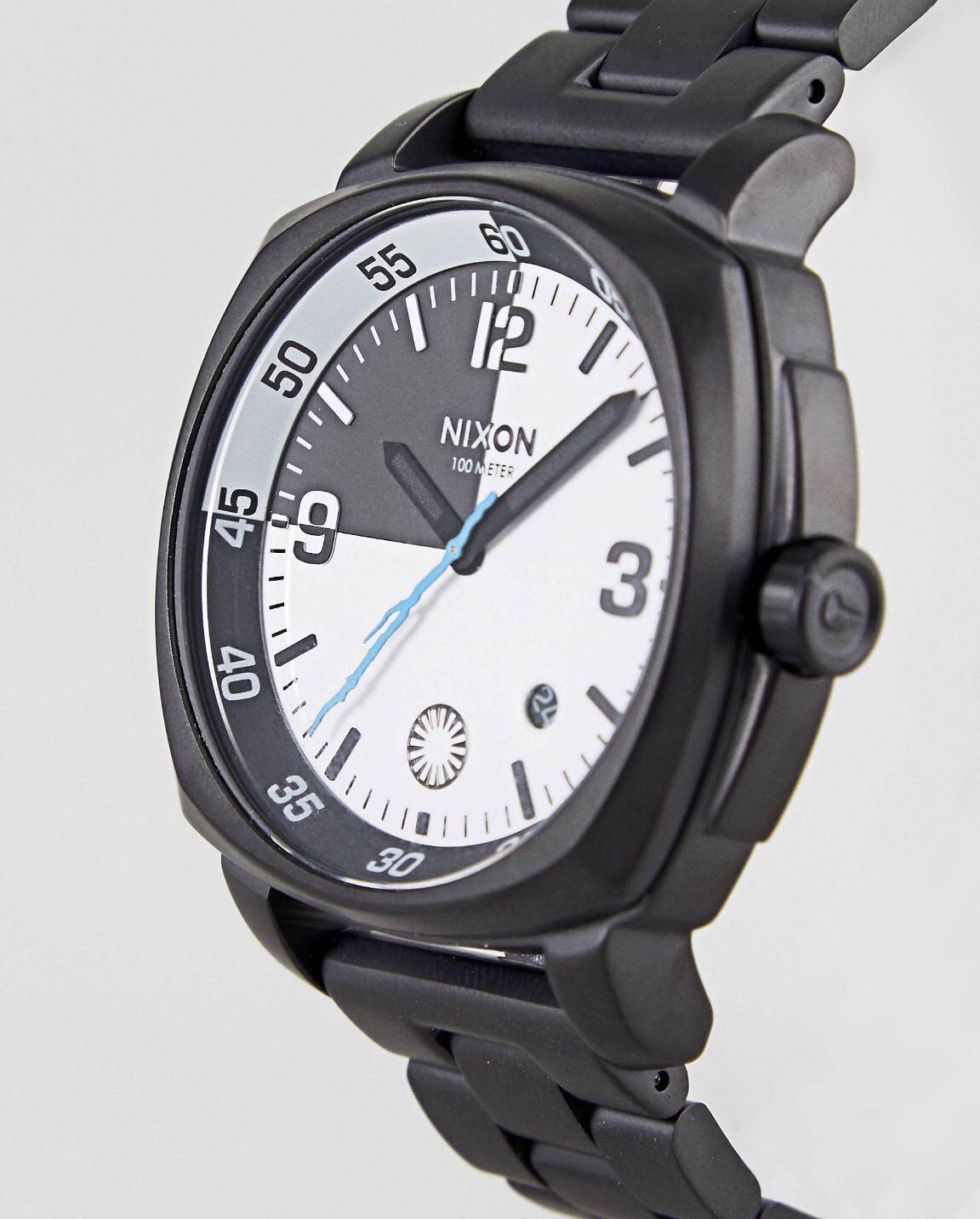 Nixon x Star Wars Executioner Trooper Watch (Category: Watches) located in Singapore. Submitted by sharukhnewman (Listing ID 178336371, Image 2). Description: Designed in collaboration with Nixon X Star Wars. Retail: $374 - 💯% Authentic! - Stainless steel strap and case - Three hand movement - Executioner Trooper lightning bolt second hand - First Order symbol to six dial - Executioner Trooper engraved image and slogan to back - Date window - Da