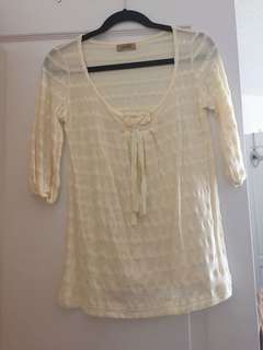 Light yellow striped top front details
