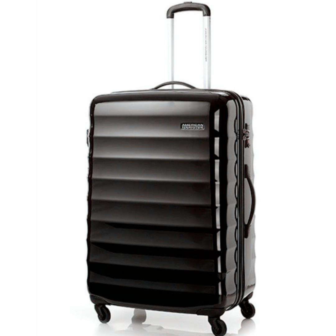 american tourister paralite spinner