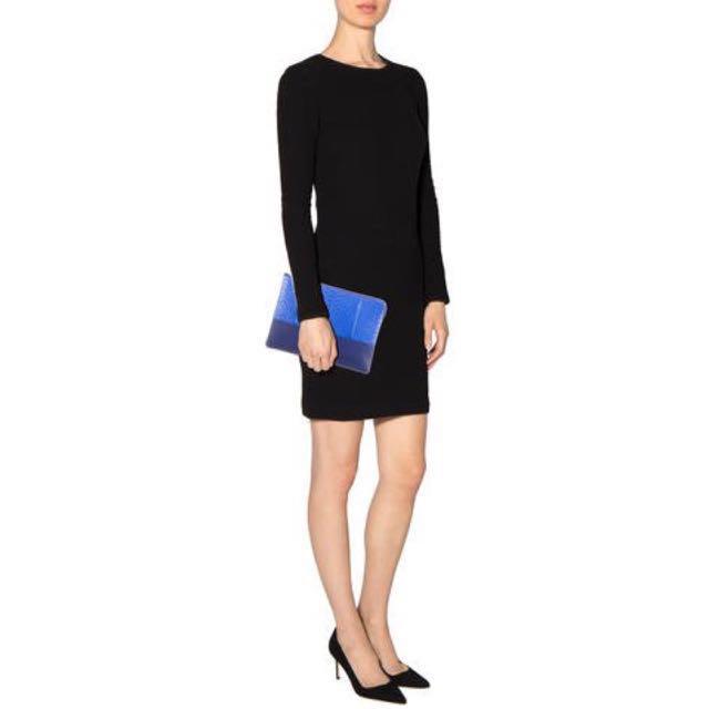 Celine Solo Clutch Pouch Python Skin (Category: Luxury Bags & Wallets) located in Manila. Submitted by bagstagram (Listing ID 134228420, Image 3). Description: Blue python and lamb skin leather Céline Solo Pouch with gold-tone hardware, logo at front exterior and zip closure at top. Includes dust bag. Python is a premiere leather. Price reflects this. Height: 7" Width: 9.25" Depth: 0.25 Retail: SGD 1,300 Condition: Like New .