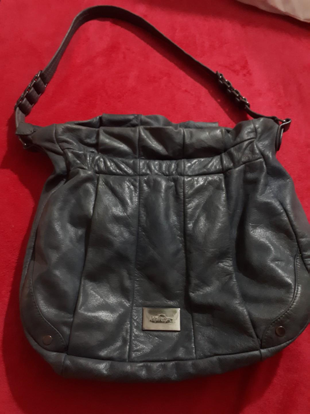 Kipling leather store handbags