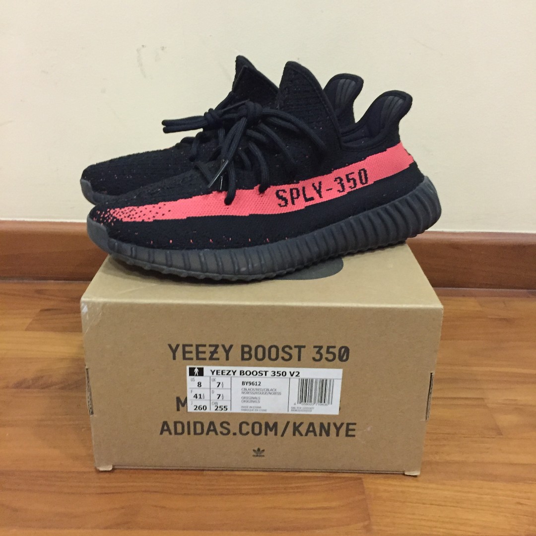 yeezy black with red stripe