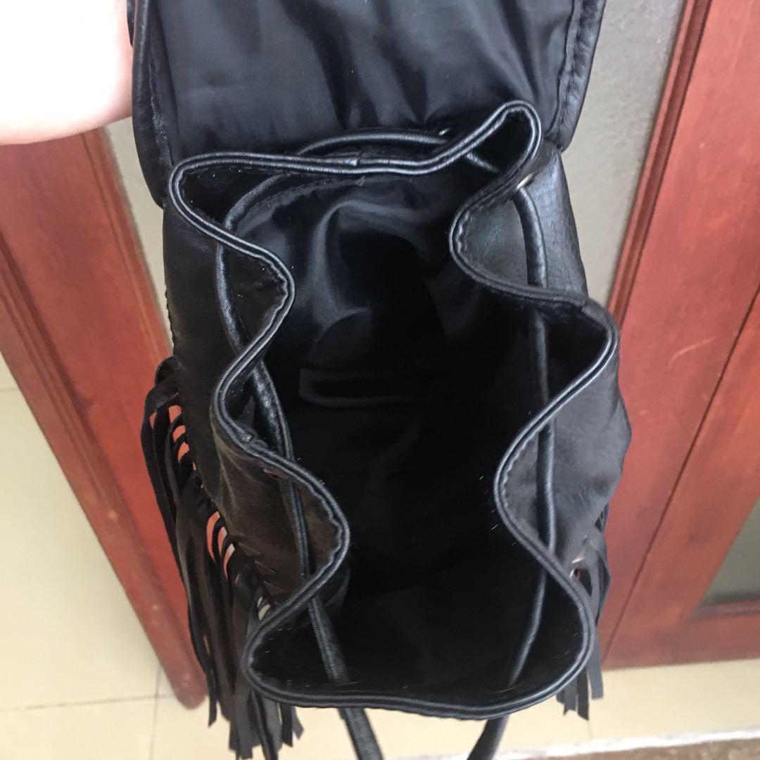 black fringe backpack